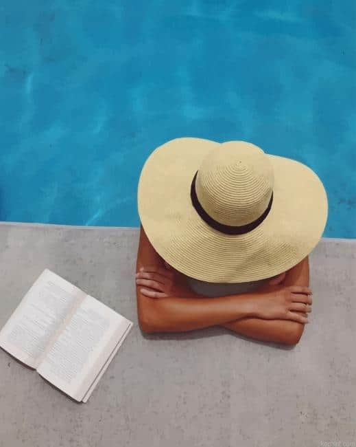 Woman Sitting In A Swimming Pool In A Large Sunhat New Painting By Numberss.png